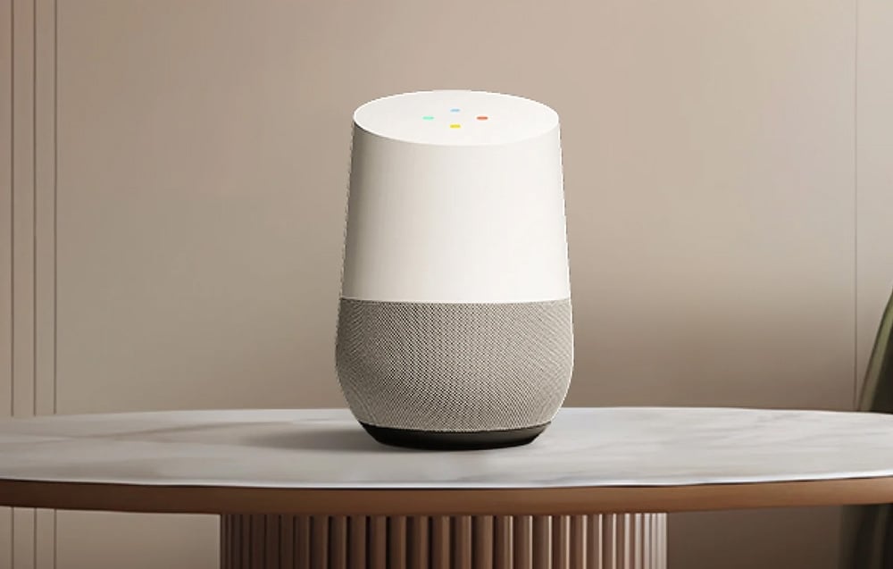 Biely reproduktor stojaci na okrúhlom stole integrovanom so svietidlom Yeelight Mars C400.