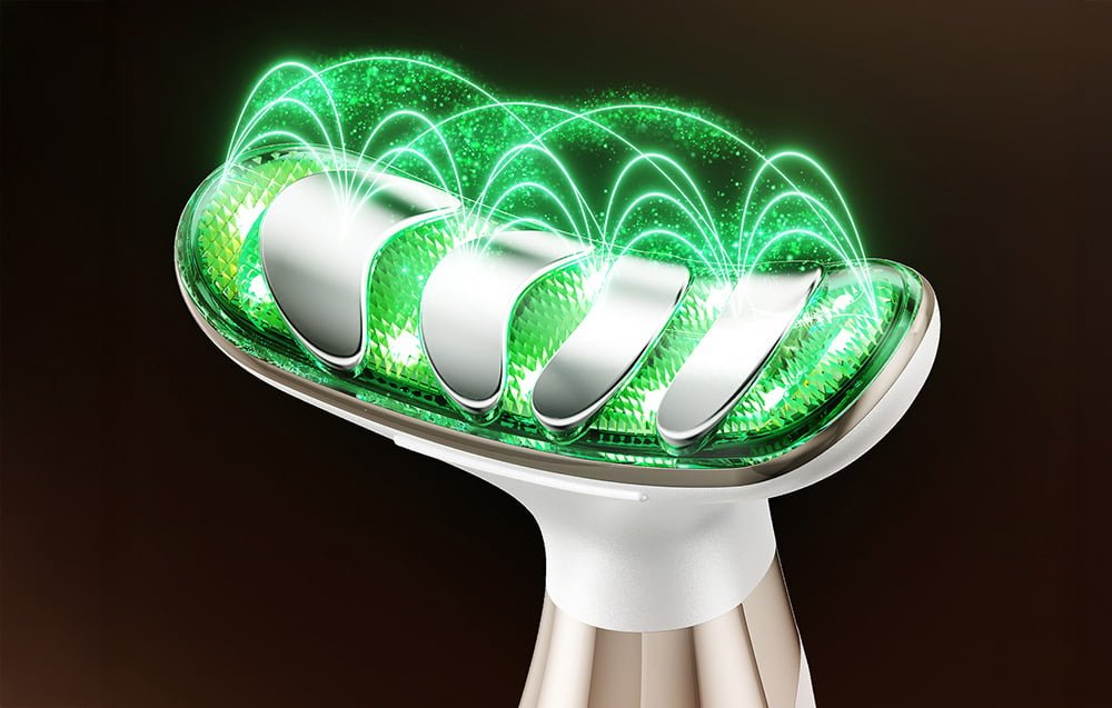 Detailný záber na hlavu masážneho prístroja so zeleným osvetlením