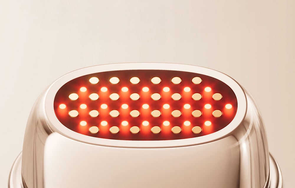 Detailný záber na hlavu masážneho prístroja