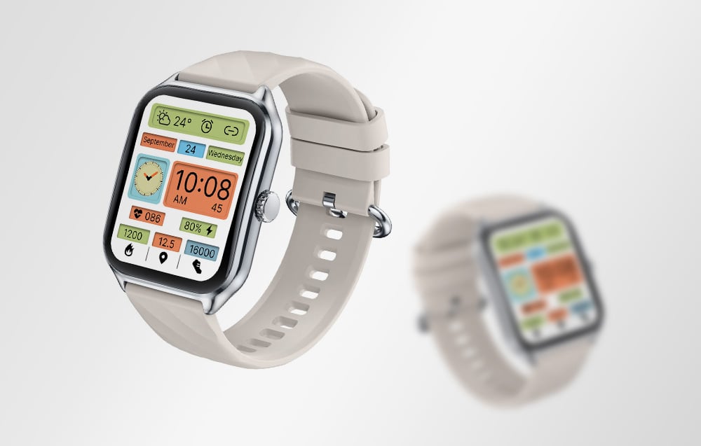 Dva modely inteligentných hodiniek Zeblaze stojace vedľa seba, z ktorých jeden je v pozadí rozmazaný